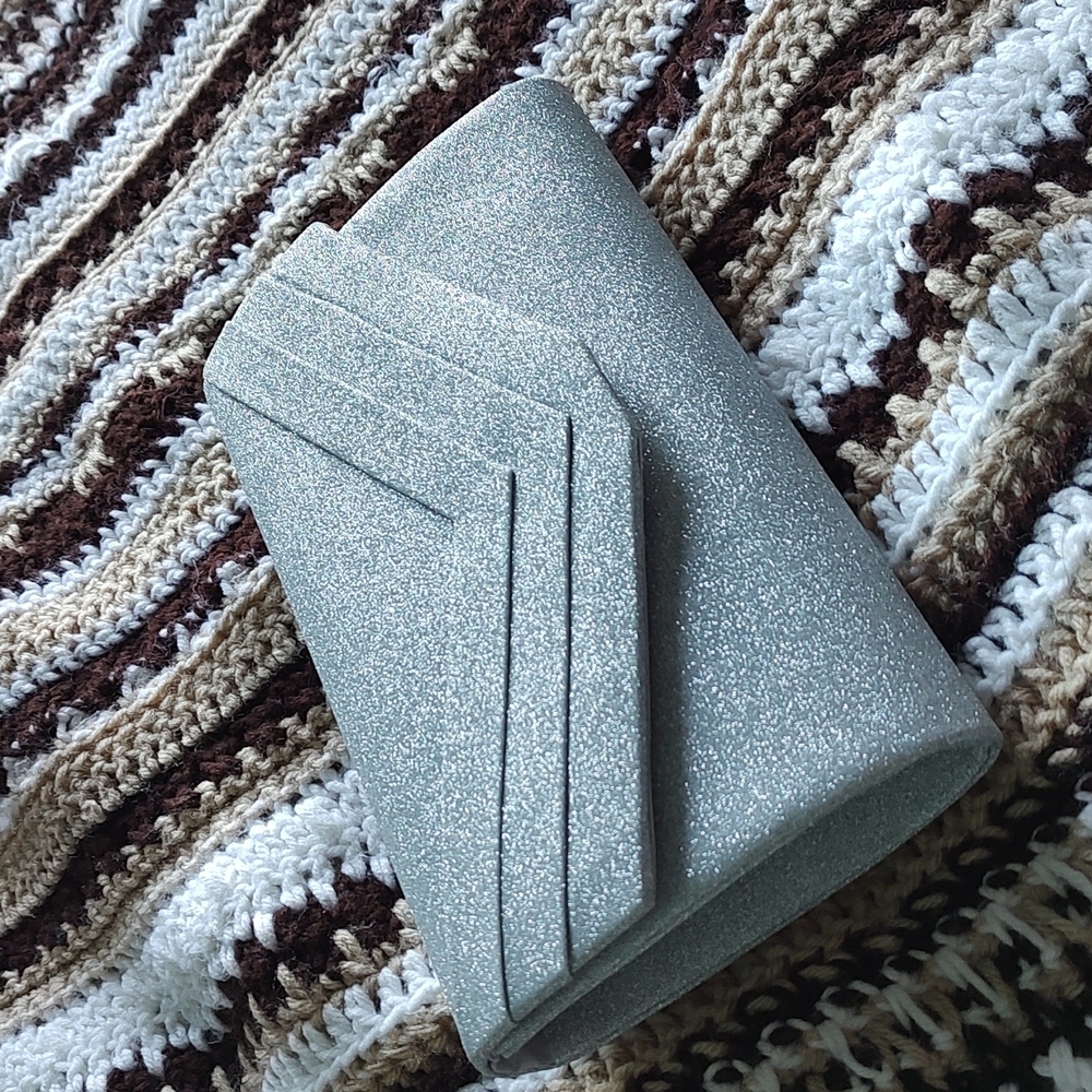 Silver sparkle clutch